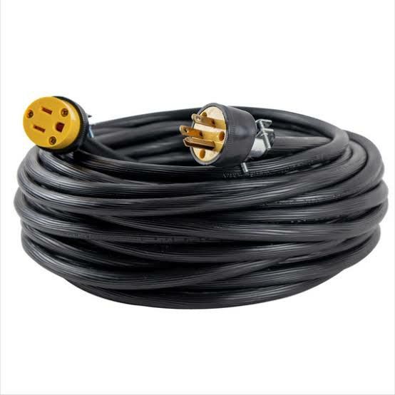 Câble prolongateur électrique industriel noir fiches dorées générateur enroulé
